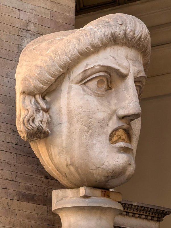 An odd bust with an open mouth