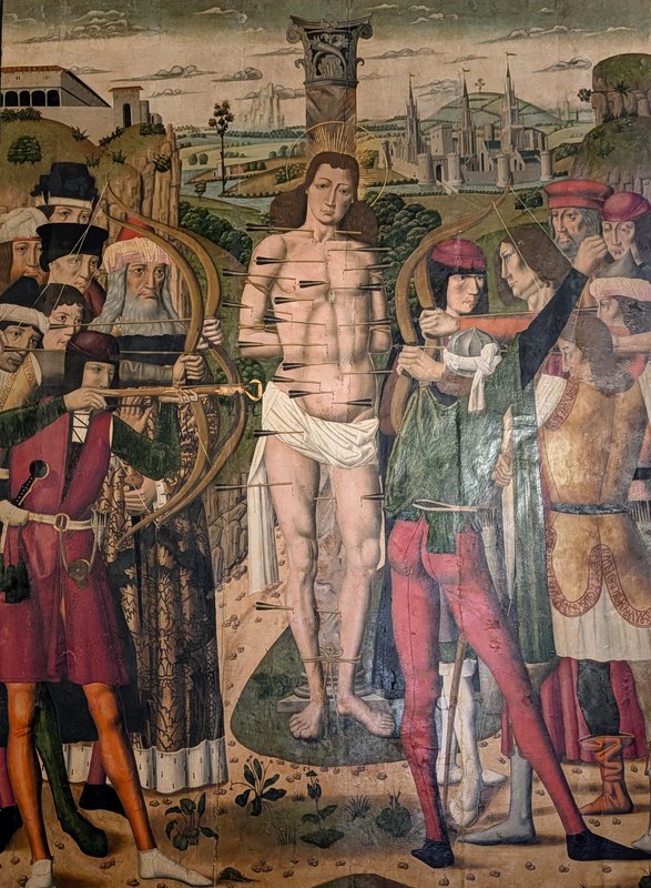 St. Sebastian, pierced by arrows from soldiers with nice butts