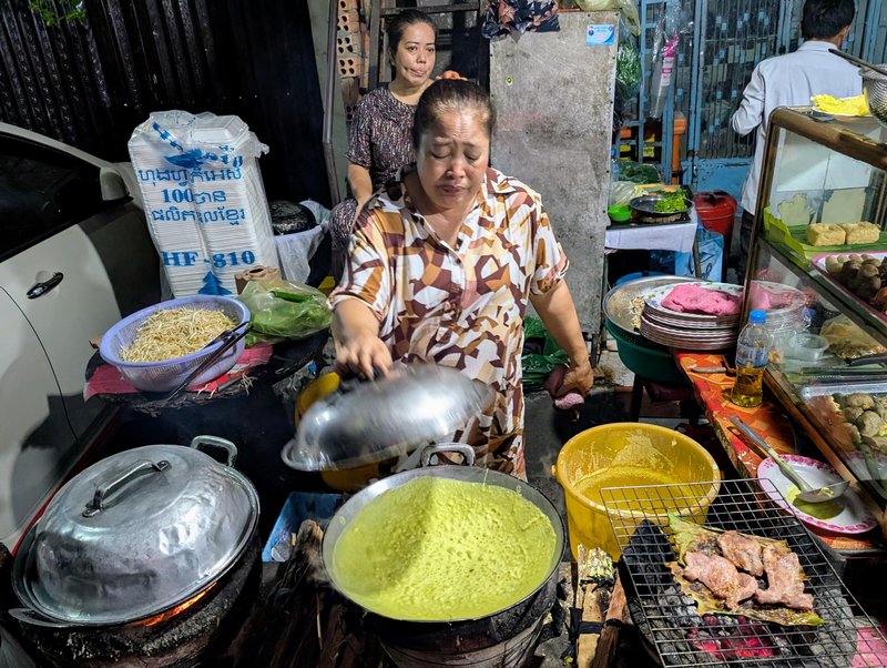 One of our snacks being made, a rice flour crepe stuffed with chicken