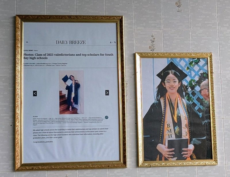Framed photo and newspaper article about a 2023 high school graduate