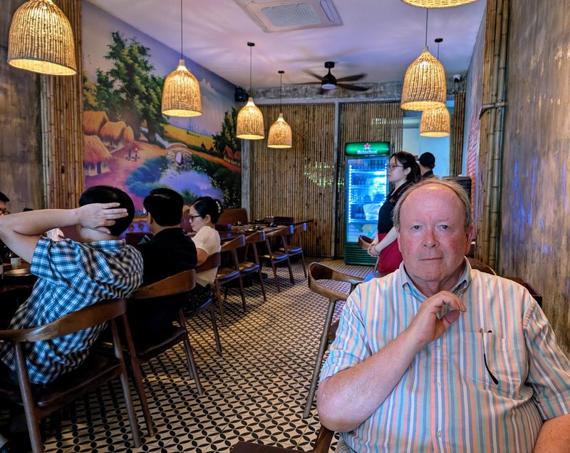 Ken at Hoang's enjoying stir fried noodles