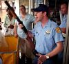 cop with shotgun. AP Photo/Austin American-Statesman, Matt Rouke